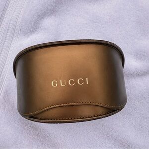 GUCCI oversized bronze-color eyeglasses case. With microfiber cleaning cloth.